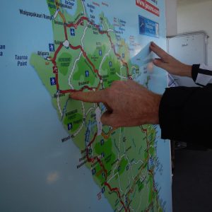 Rob uses the ferry map to show us a route