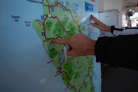 Rob uses the ferry map to show us a route