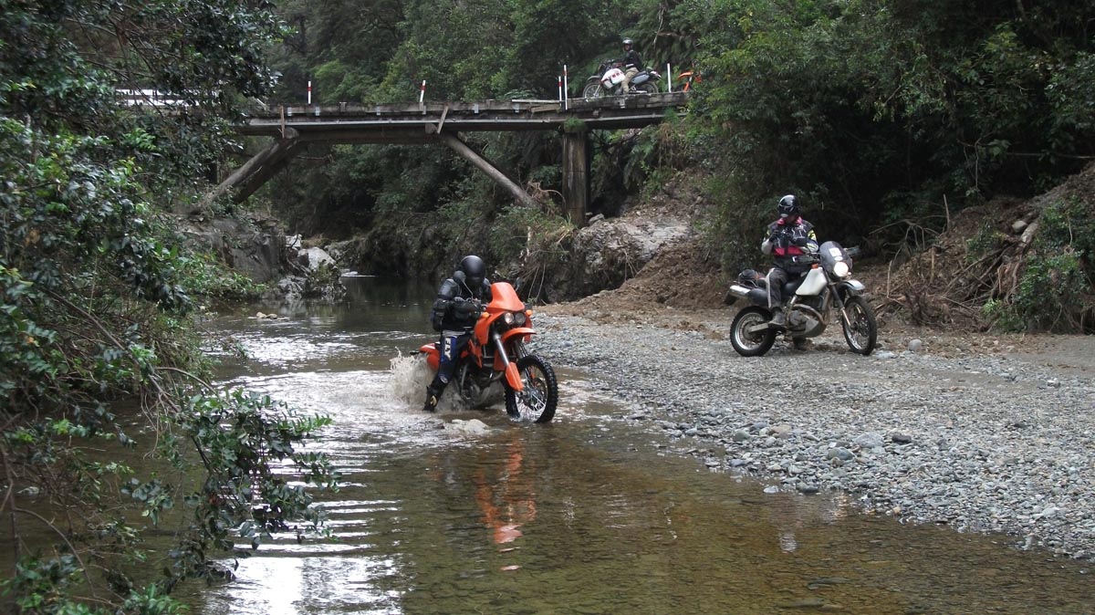 Playing in a stream on Maungatapu Track