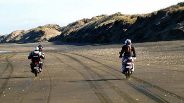 Riders on Muriwai Beach
